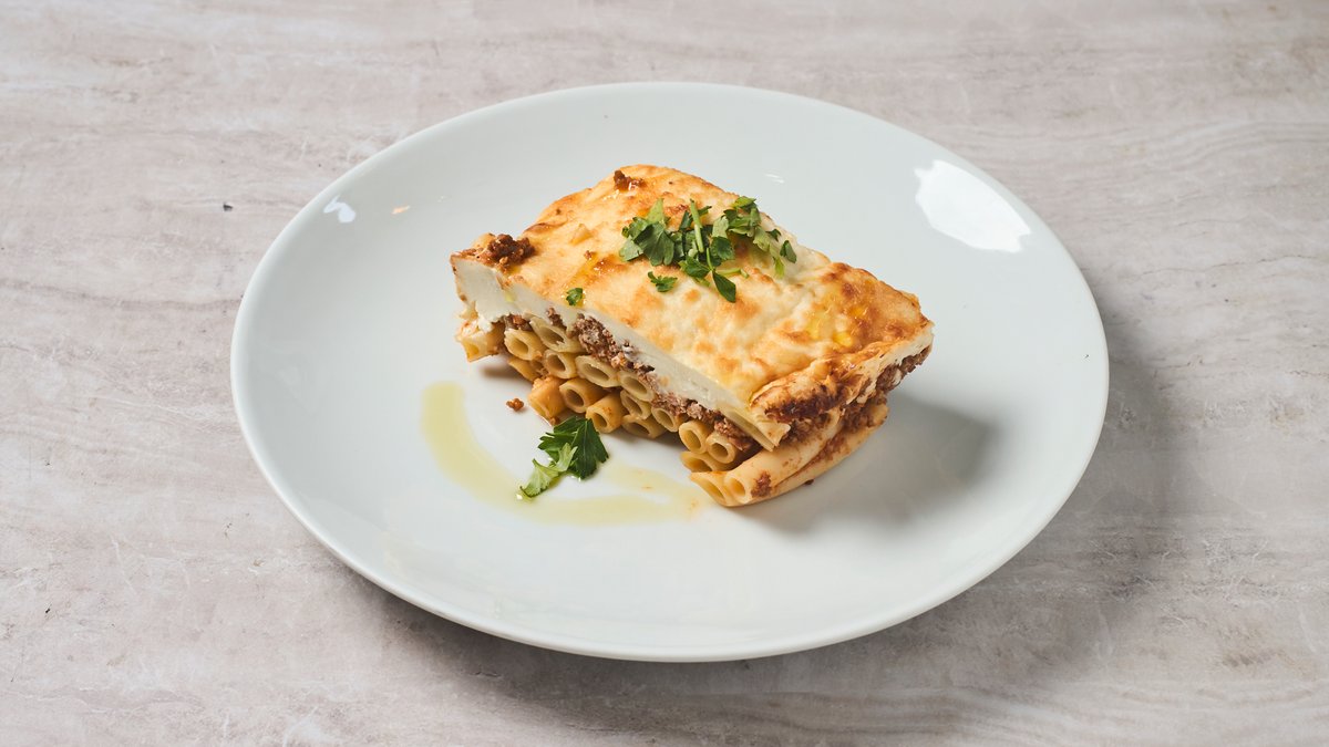 Greek pastitsio layered with bucatini pasta, spiced beef ragù and béchamel at Cookaki Koukaki