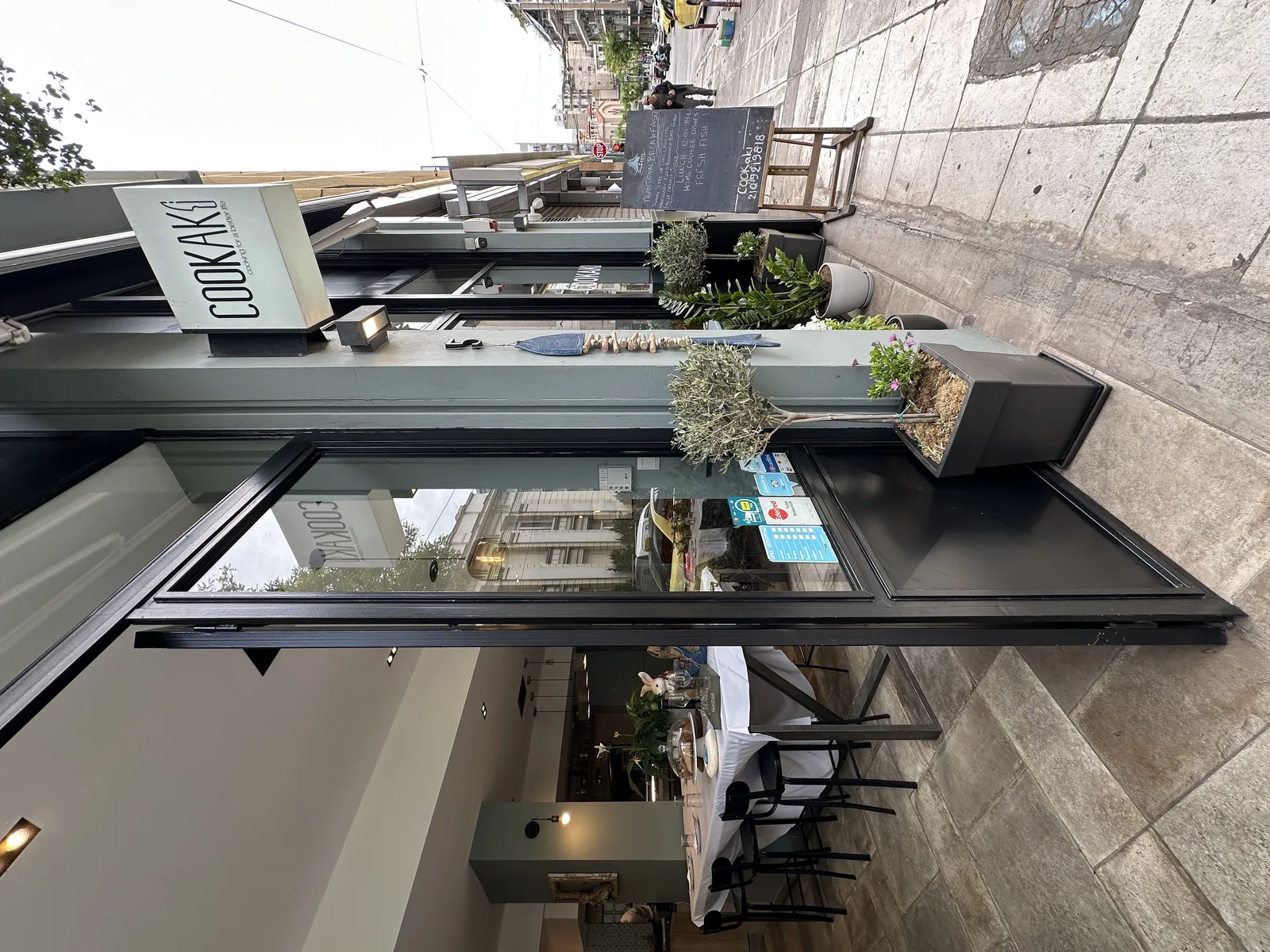 COOKaki Bell Kitchen exterior facade with signage on Petméza 5, Koukáki, Athens